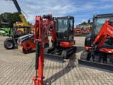 2025 Kubota KX037-4 mini excavator, front three-quarter view