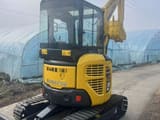 2024 Komatsu PC35MR mini excavator, front three-quarter view