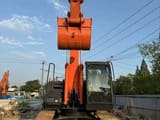 Hitachi ZX120 crawler excavator, front view