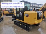 2023 Caterpillar 306E2 mini excavator, rear three-quarter view