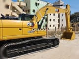 2026 Caterpillar 323D3 crawler excavator side view