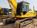 2010 Komatsu PC360 crawler excavator, front three-quarter view