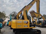 Caterpillar 312D2 GC crawler excavator, rear three-quarter view
