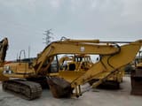2000 Caterpillar 320B crawler excavator, side view