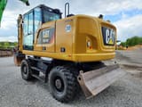 2018 Caterpillar M316F wheel excavator, rear three-quarter view
