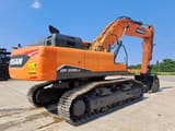 2023 Doosan DX530LC-7M crawler excavator, rear three-quarter view