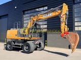2016 CASE WX148 wheel excavator, side profile view