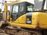 2016 Komatsu PC130-7 crawler excavator, side view