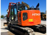 2019 Hitachi ZX135US-6 crawler excavator, rear three-quarter view