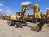 2014 Wacker Neuson EW100 wheel excavator, front three-quarter view