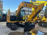 2023 Caterpillar 307 crawler excavator, side view