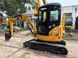 2022 Caterpillar 303CR mini excavator, front three-quarter view