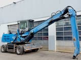 2015 Fuchs MHL 334 E material handler, side view