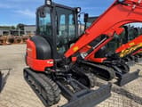 2025 Kubota KX037-4 mini excavator, front three-quarter view