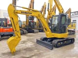 2020 Komatsu PC-55MR mini excavator, front three-quarter view