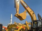 2013 Caterpillar 330D crawler excavator, side view of boom and bucket