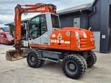2005 Atlas 1605 M wheel excavator, rear three-quarter view