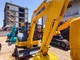 2018 Komatsu PC-55MR mini excavator, front three-quarter view