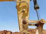 2017 Caterpillar 374FL crawler excavator boom and hydraulic cylinder detail