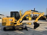 2023 Caterpillar 305.5E2 mini excavator, side profile view