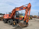 2003 Fiat-Kobelco EX135W wheel excavator, side view