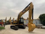 2023 Caterpillar 323 crawler excavator, side view