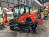 2020 Doosan DX60-9C mini excavator, front three-quarter view