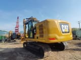 2022 Caterpillar 320GC crawler excavator, rear three-quarter view