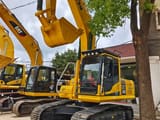 2024 Komatsu PC200 crawler excavator, front three-quarter view