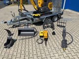 Berger Kraus BK1250JSR mini excavator on trailer with attachments