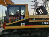 2024 Caterpillar 320BL crawler excavator side view