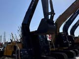 2023 Volvo EC140 crawler excavator, side profile view