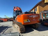 2022 Hitachi ZX210LC-7 crawler excavator, rear three-quarter view