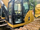 2019 Caterpillar 310 crawler excavator cab view
