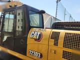 2026 Caterpillar 323D3 crawler excavator cab and engine cover view