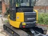 2024 Komatsu PC40MR-2 mini excavator, rear three-quarter view