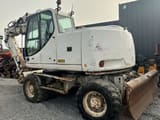2005 CASE WX165 wheel excavator, rear three-quarter view