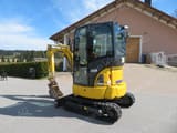 2021 Komatsu PC24MR-5 mini excavator, front three-quarter view