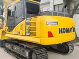 2023 Komatsu PC130 crawler excavator, rear three-quarter view
