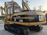Caterpillar 320B crawler excavator, rear three-quarter view