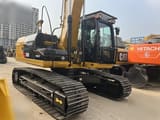 Koparka gąsienicowa 2010 Caterpillar 320D, widok z boku