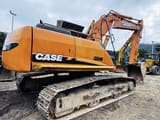 Case CX240B crawler excavator, side view