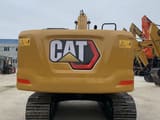 2023 Caterpillar 320GC crawler excavator, rear view
