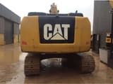 2016 Caterpillar 320F crawler excavator, rear view
