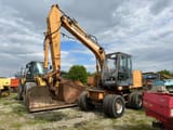 1997 CASE 588-P wheel excavator, front three-quarter view