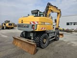 2012 Liebherr A316 LITRONIC wheel excavator, rear three-quarter view