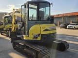 2023 Yanmar VIO55 mini excavator, rear three-quarter view