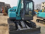 2023 Kobelco SK75 mini excavator, front three-quarter view