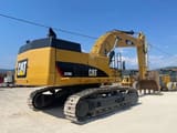 2012 Caterpillar 374D crawler excavator, rear three-quarter view