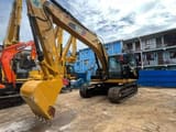 2008 Caterpillar 320B crawler excavator, front three-quarter view